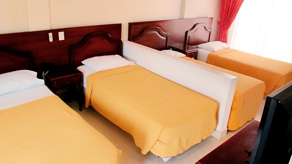 Hotel Palmetto Girardot Ruang foto